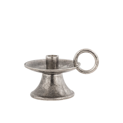 Silver candle holder with ring on a white background