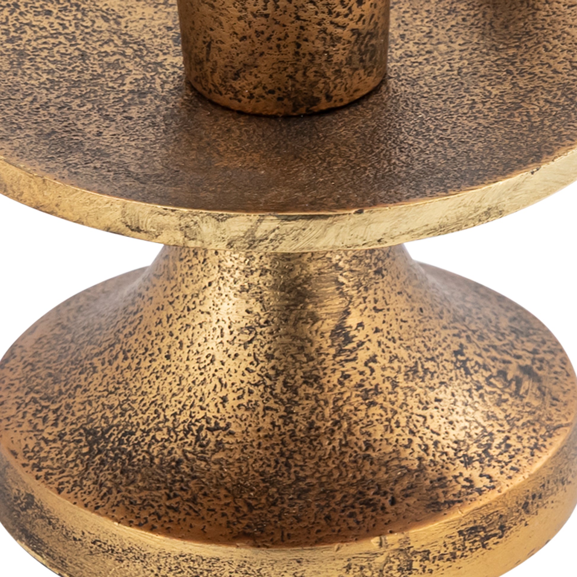 Close-up of a textured bronze candle holder on a white background