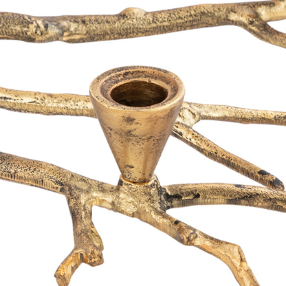 Decorative candle holder with branch-like design on a white background
