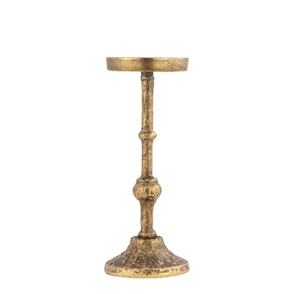 Decorative gold candle holder on a white background