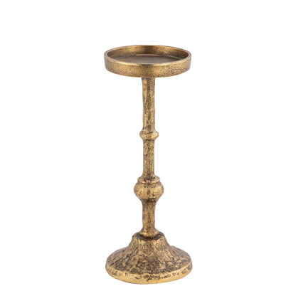 Decorative gold candle holder on a white background