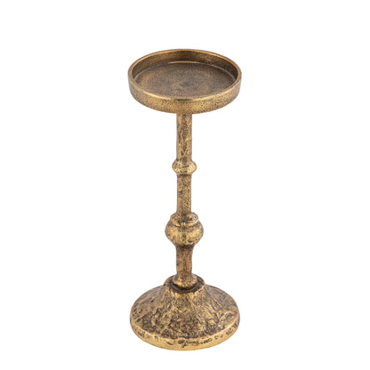Brass candle holder on a white background