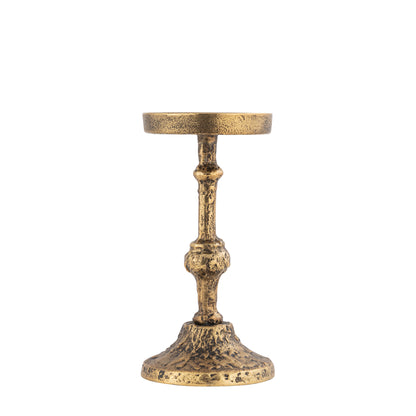 Brass candle holder on a white background