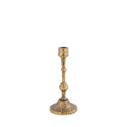 Gold candle holder on a white background