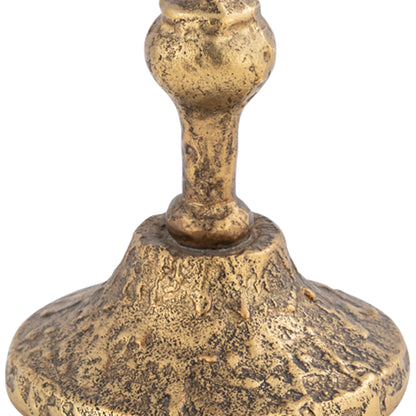 Decorative gold candle holder on a white background