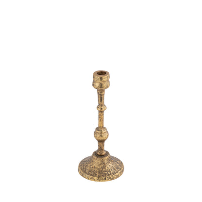 Brass candle holder on a white background