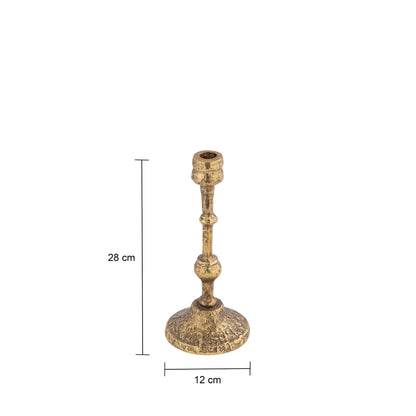 Decorative gold candle holder on a white background