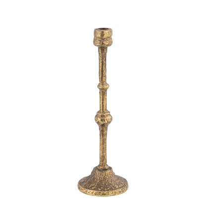 Brass candlestick on a white background