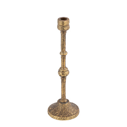 Brass candle holder on a white background