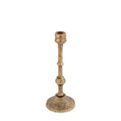 Brass candle holder on a white background