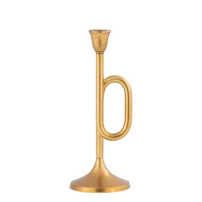 Gold trumpet-shaped candle holder on a white background