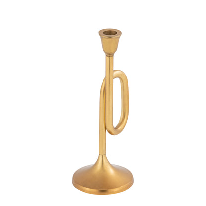 Gold trumpet-shaped candle holder on a white background