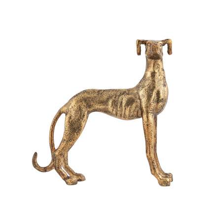 Brass statue of a dog on a white background