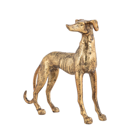 Gold statue of a dog on a white background