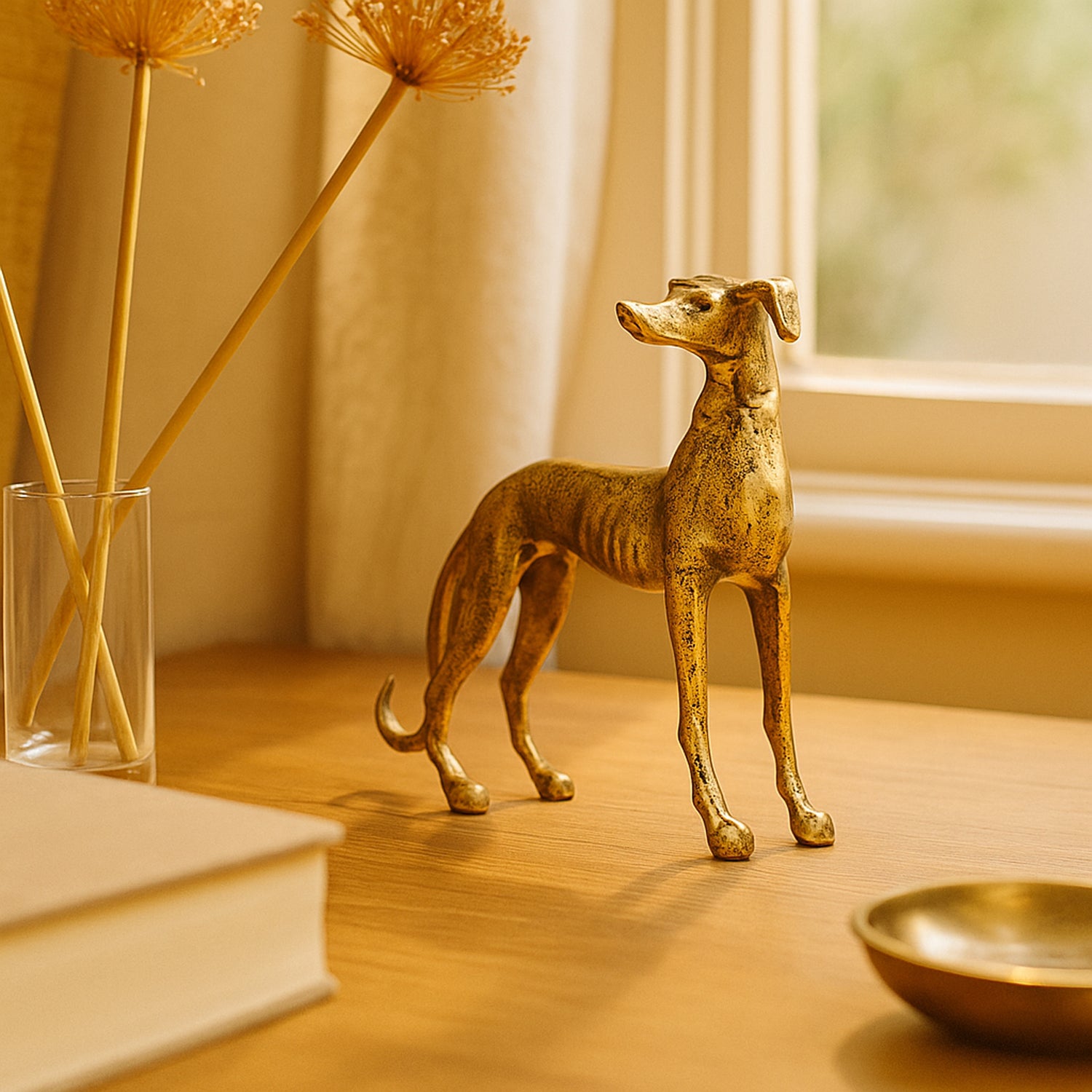 Gold dog figurine on a wooden surface