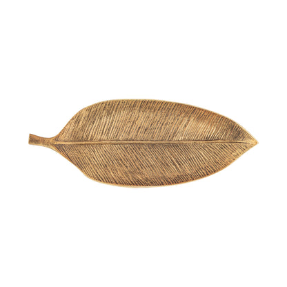 Gold leaf-shaped decorative tray on a white background